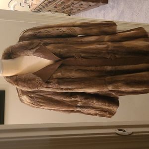 Fur coat leather trim